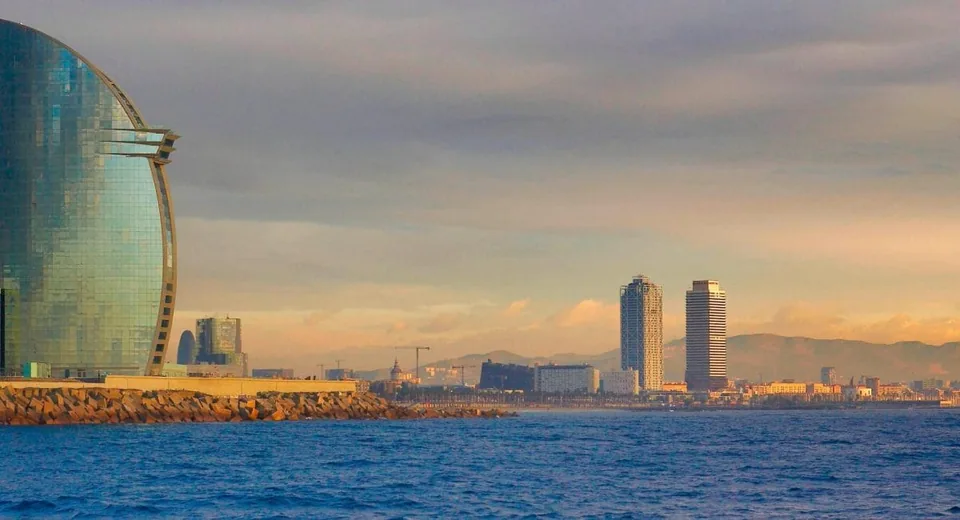 Panoramic view of Barcelona from the sea, showing the W Hotel and the two towers next to Port Olimpic